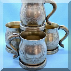 K21. Set of 4 white Metal mugs. 4”h - $12